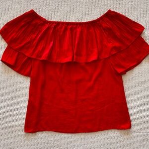 Maje top in rich red off shoulder 100% polyester but feels like silk